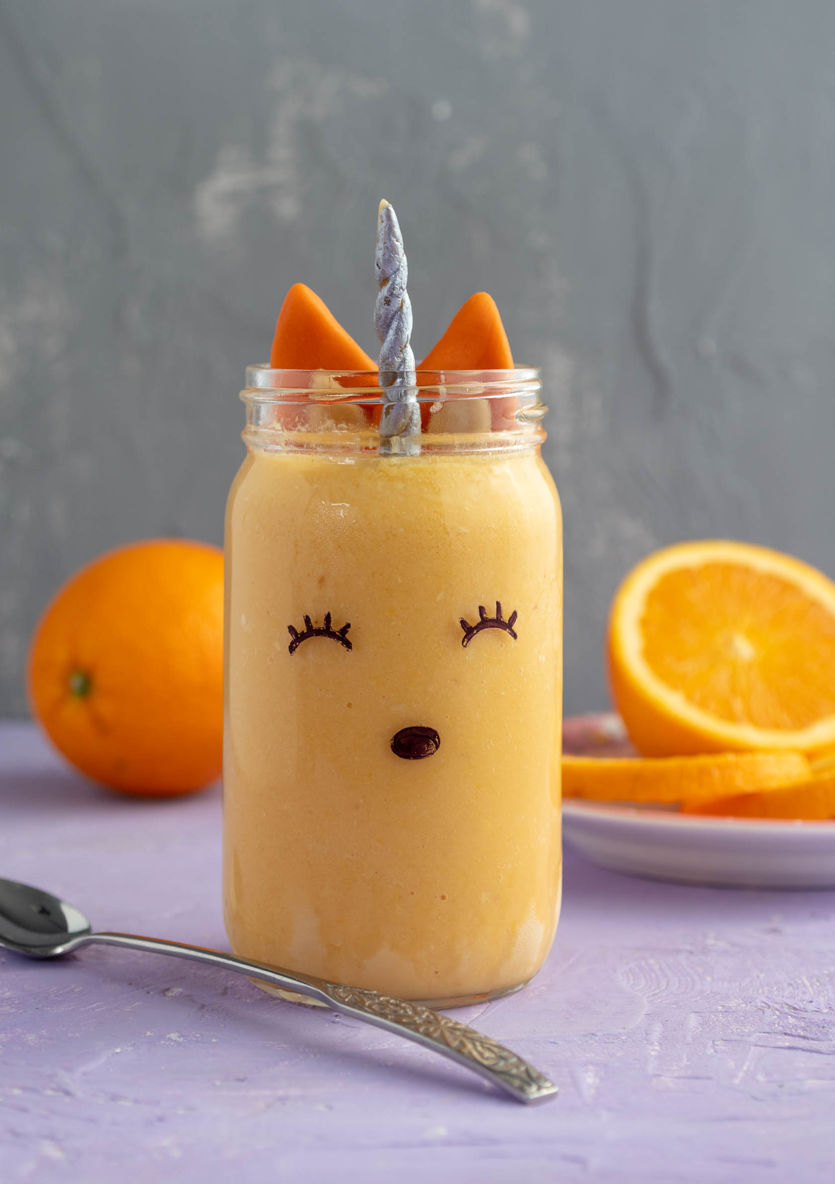 vegan orange julius decorated to look like a unicorn fox