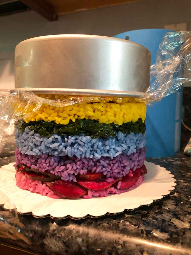 assembling the savory vegan sushi cake
